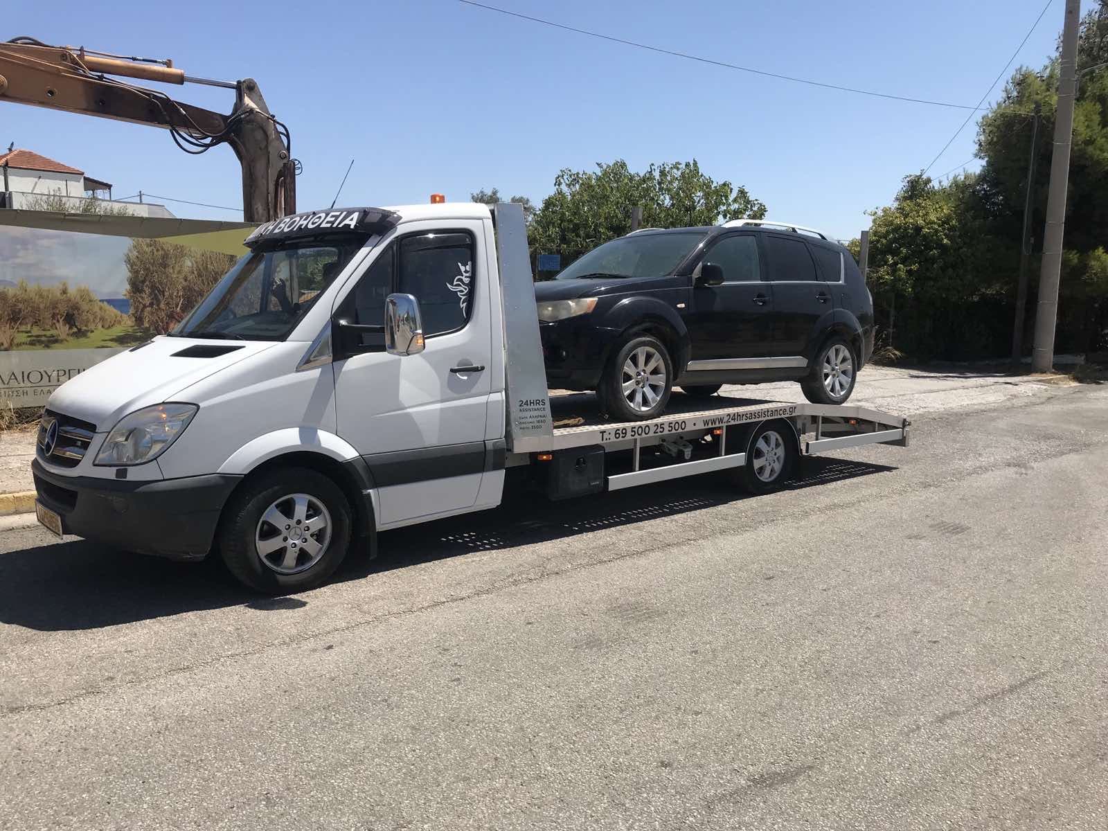 Γερανός μεταφοράς οχήματος σε εργασία